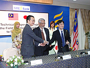 Signing ceremony on Record of Discussion (RD) and Seminar in Kuala Lumpur (KL).